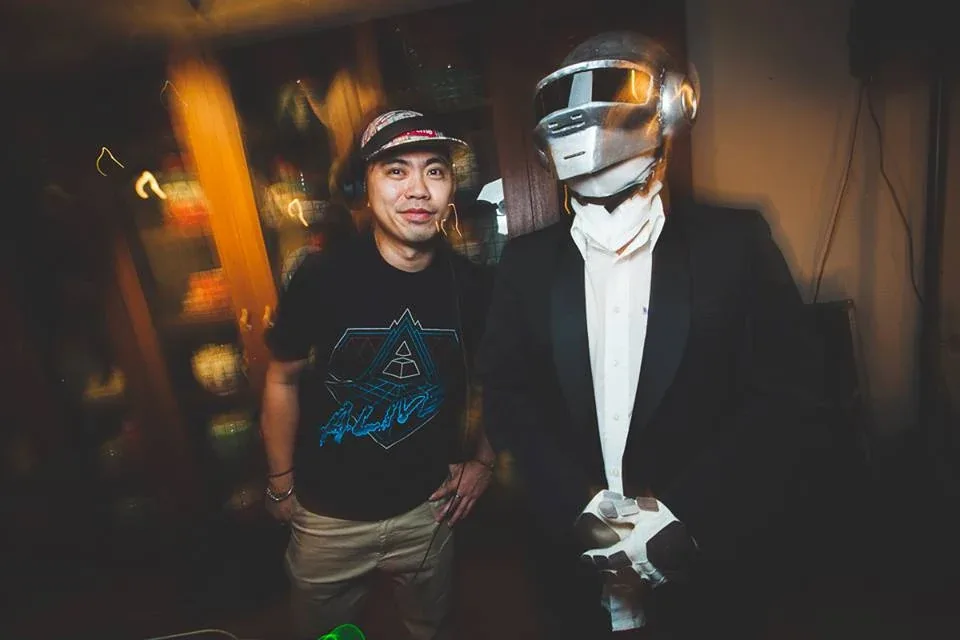A helmeted guest at the Wondamamma headphone event