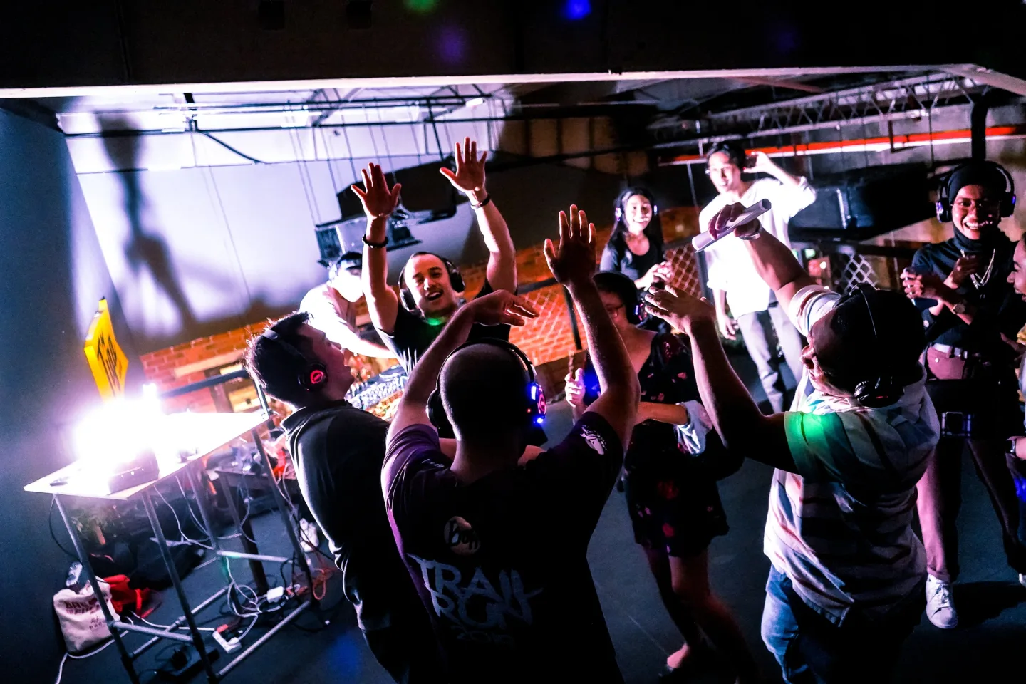 Guests dancing close to the DJ at RIUH