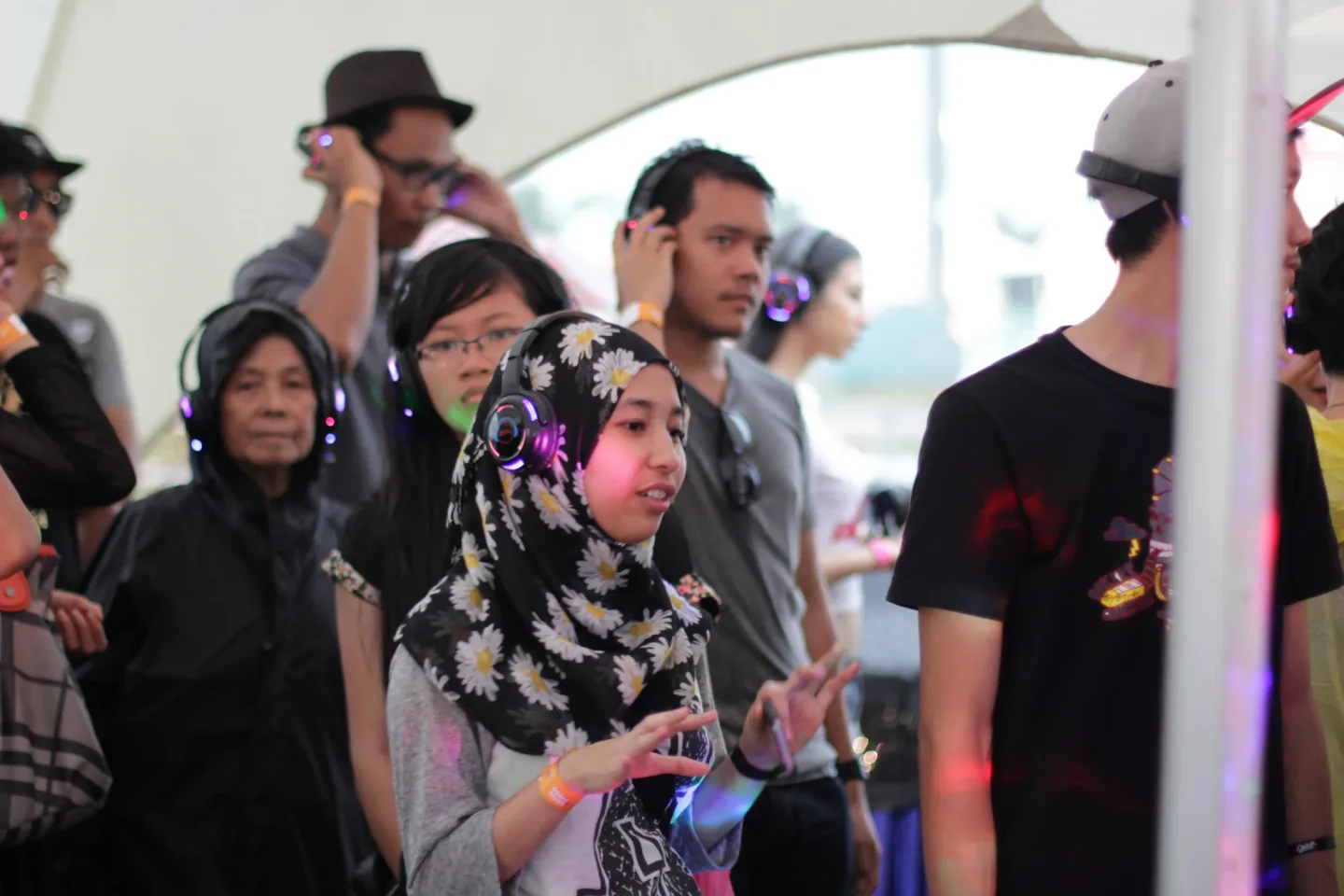 Guests wearing wireless headphones at Good Vibes Festival