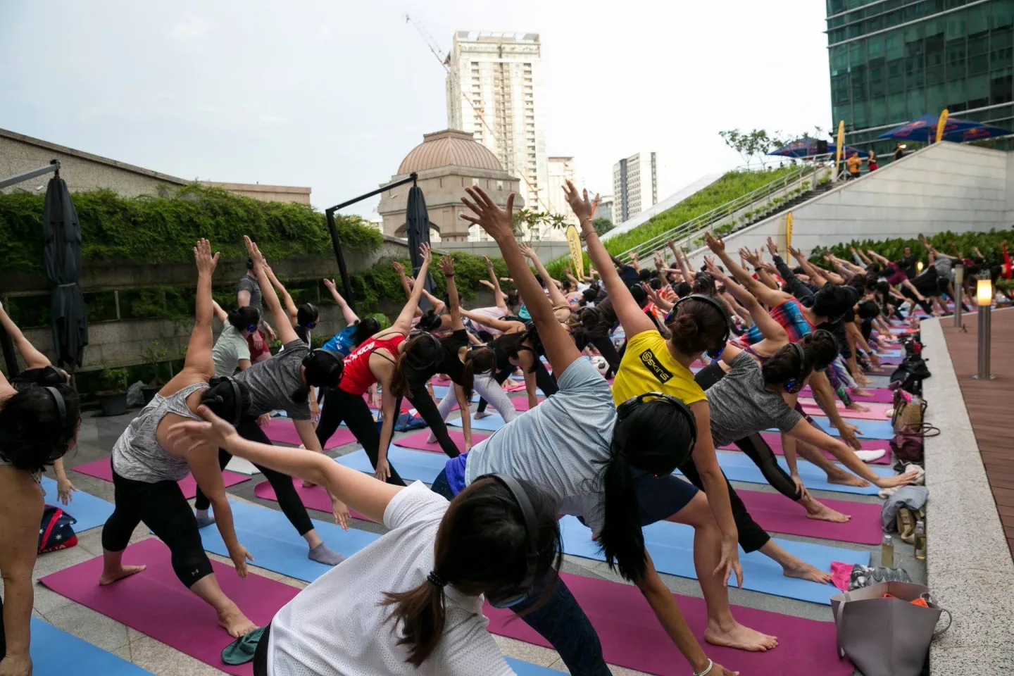 A wide view of the silent yoga class at DC Mall