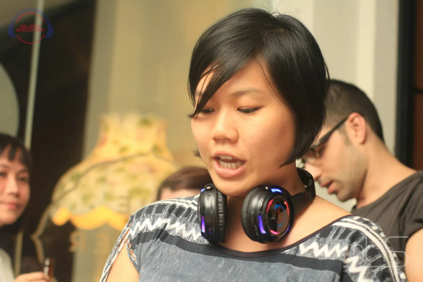 A guest with wireless headphones at the Random Access Memories album launch