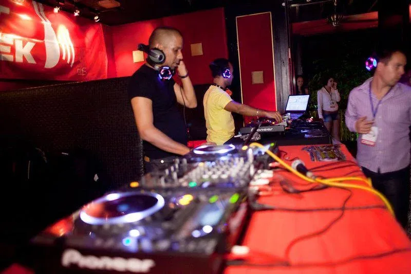 A DJ working at the Silent Discotek Latino Party