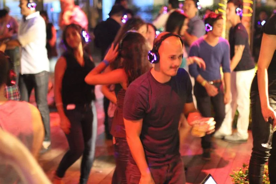 Guests dancing together at the ACME event