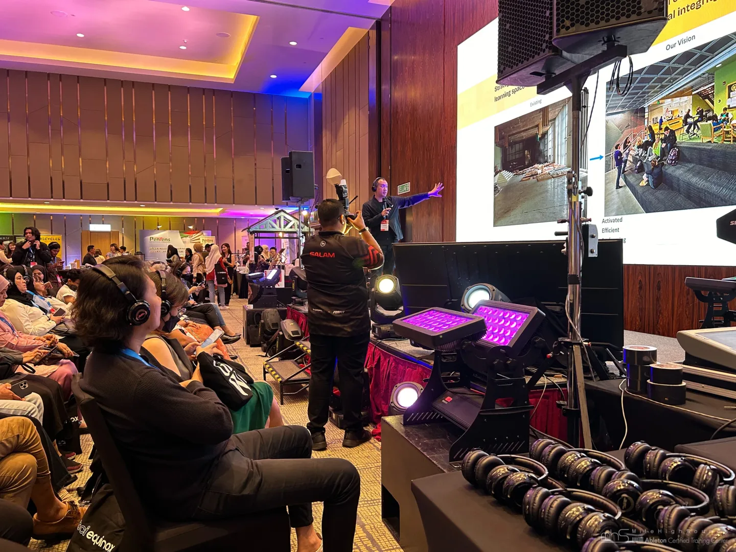 Presenter and wireless headphone system at the Johor conference
