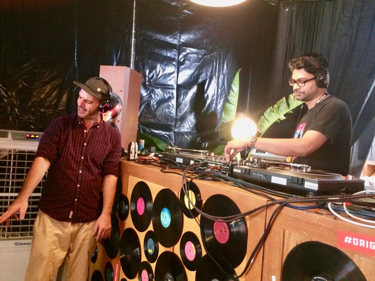 DJs and guests inside the Good Vibes Festival 2018 booth